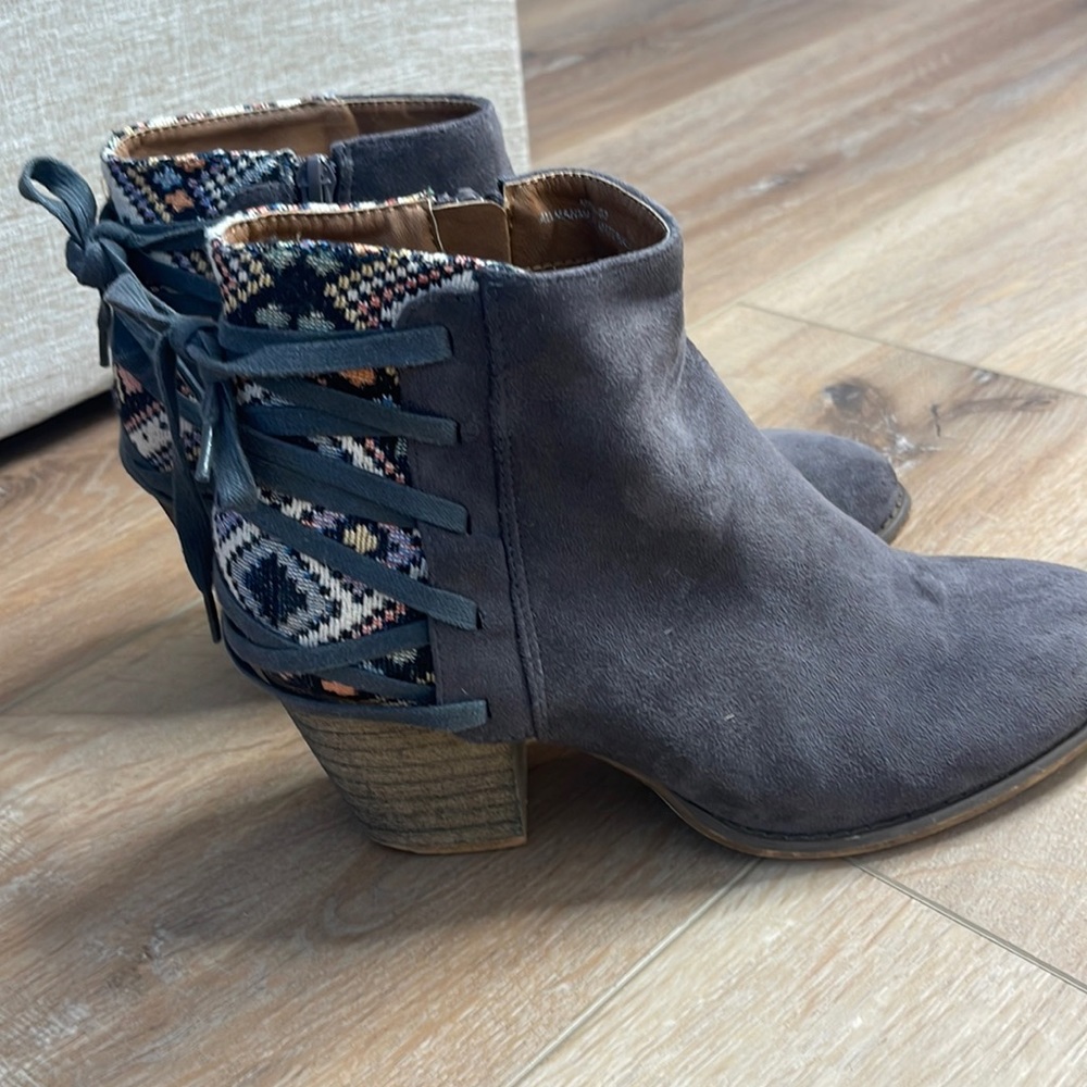 Gray suede boots with tapestry print and lace tie up in back.